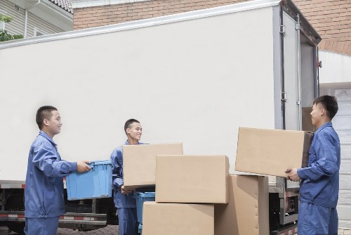 Business relocation boxes and office furniture prepared for transport