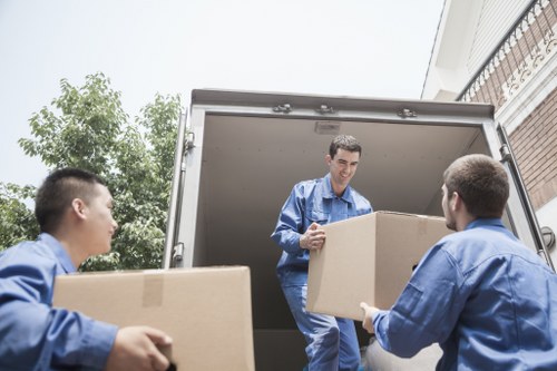 Furniture being loaded into a removals truck in London
