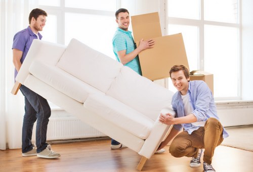 Careful packing of fragile items for a London home move