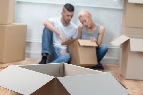 Professional movers handling furniture in London