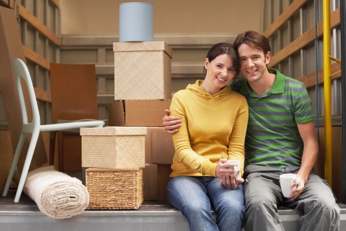 Packed boxes and furniture inside a London storage unit