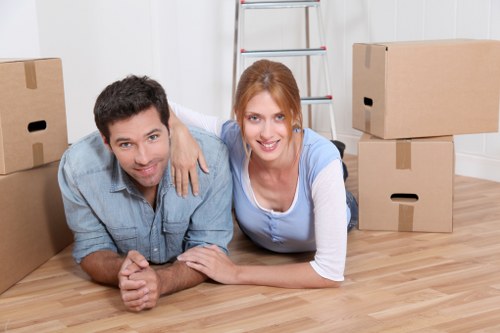 Organized boxes and packing materials prepared for a London house move