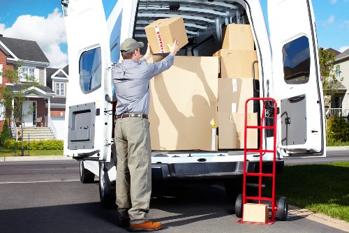 Office furniture removals in London with desks and chairs being relocated