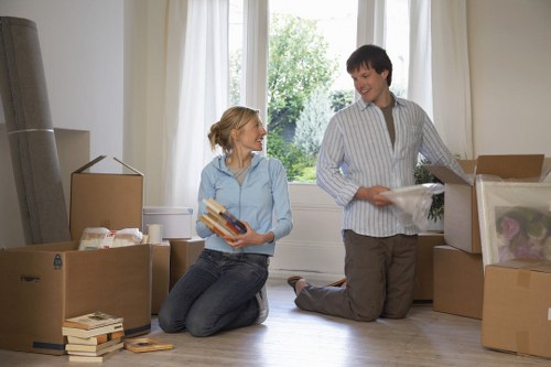 Professional moving team handling boxes and furniture in London